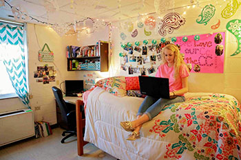 Female Student Studying in Residence Hall