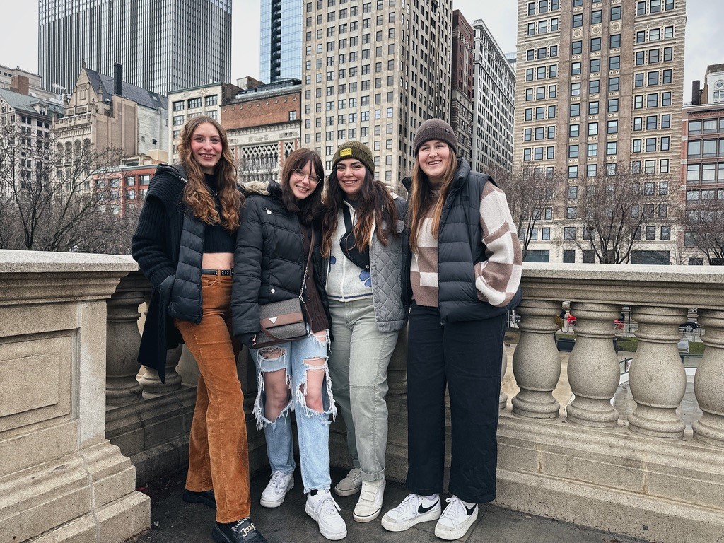 Hannah White '24, Scarlett Catanzaro '24, Lilibeth Castillo '23, and Alivia Garcia '23 enjoy Chicago during the Literary Interest Society trip in the spring 2023.