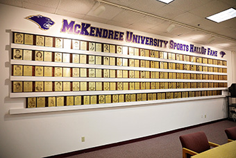 The Sports Hall of Fame Room in the Melvin Price Convocation Center received a dramatic makeover last July. The plaques that highlight student-athletes’ accomplishments have been reorganized under the Bearcat athletics logo for a neater, improved appearance.