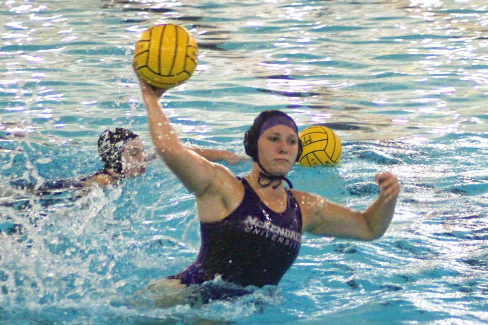 McKendree Women's water polo athlete throwing ball