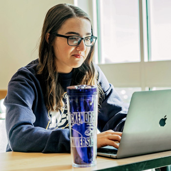 Female Student at Computer