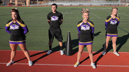 Photo of Adam with fellow Cheerleaders