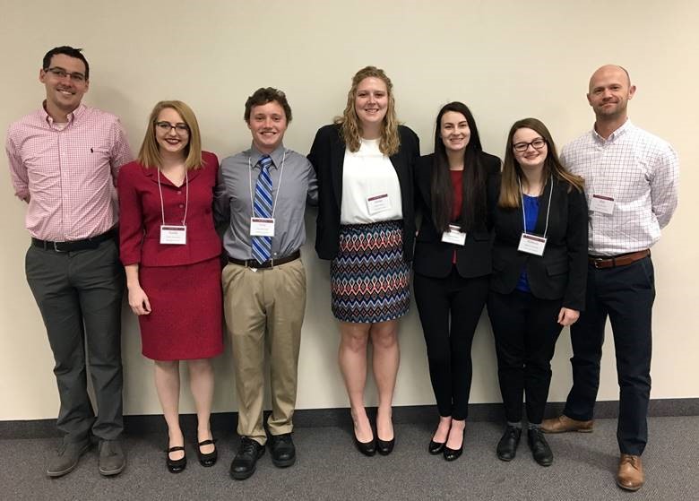 Dr. Gerald McDonnell, Noelle Zichefoose, Cory Berberich, Jordan Morton, Raina Isaacs, Rebecca Chicosky and Dr. Guy Boysen at the ILLOWA Undergraduate Psychology Empirical Research Conference on April 21 at Eureka College.