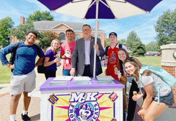 President Dan Dobbins with Students